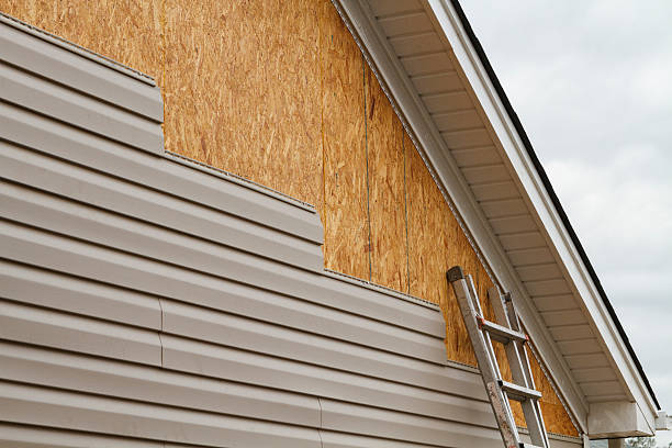 Professional Siding Replacement technician working in Skykomish, WA